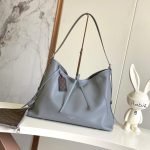 Louis Vuitton CarryAll MM — Louis Vuitton handbag detail view 2
