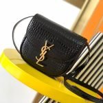 KAIA SMALL SATCHEL IN SHINY CROCODILE-EMBOSSED LEATHER — Saint Laurent handbag detail view 2