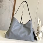 Louis Vuitton CarryAll MM — Louis Vuitton handbag detail view 4