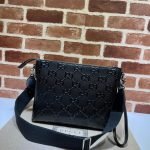 GG embossed medium messenger bag — Gucci handbag detail view 4