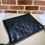 GG embossed medium messenger bag — Gucci handbag detail view 5