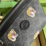 GG belt bag with tiger print — Gucci handbag detail view 6