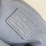 Louis Vuitton CarryAll MM — Louis Vuitton handbag detail view 7