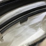 GG embossed medium messenger bag — Gucci handbag detail view 7