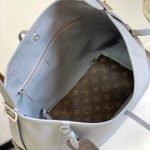 Louis Vuitton CarryAll MM — Louis Vuitton handbag detail view 8